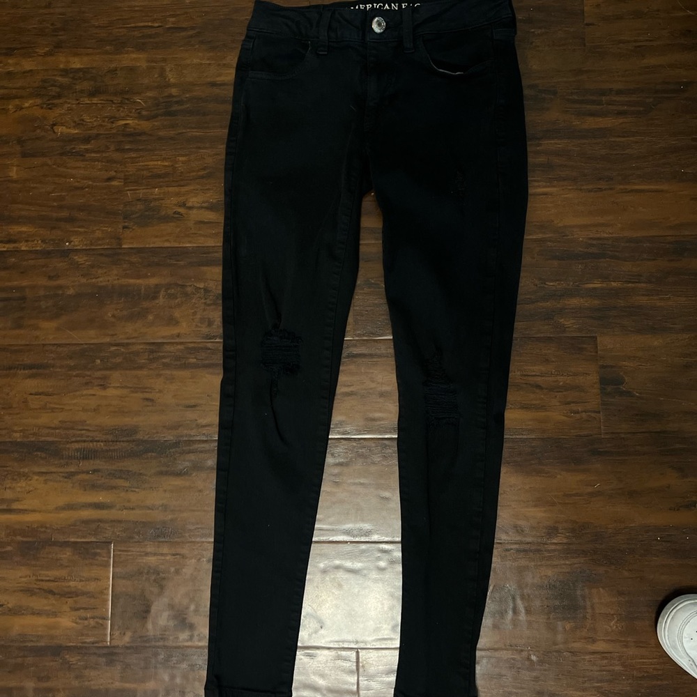 Black ripped skinny jeans AE